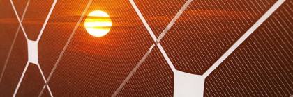 Solar panel and red sun